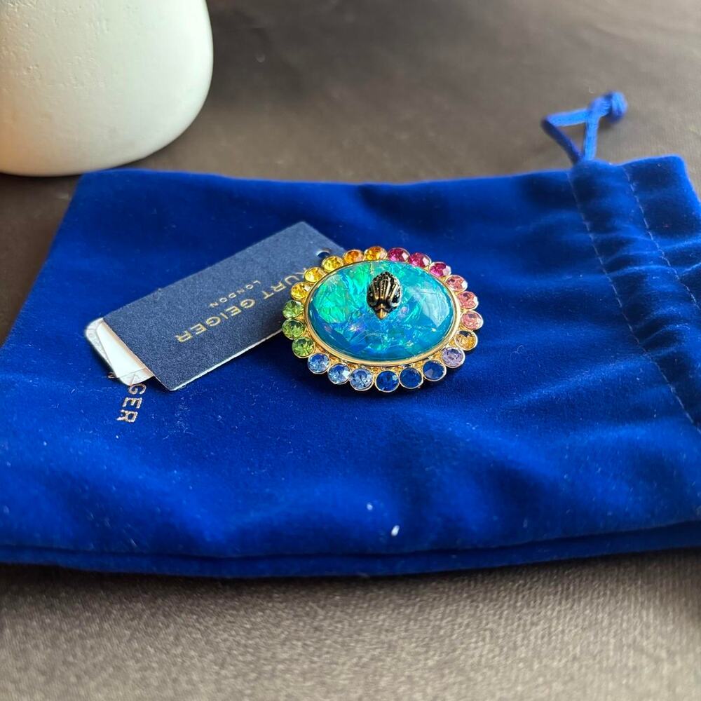 Kurt Geiger blue & green shell brooch with rainbow gemstones